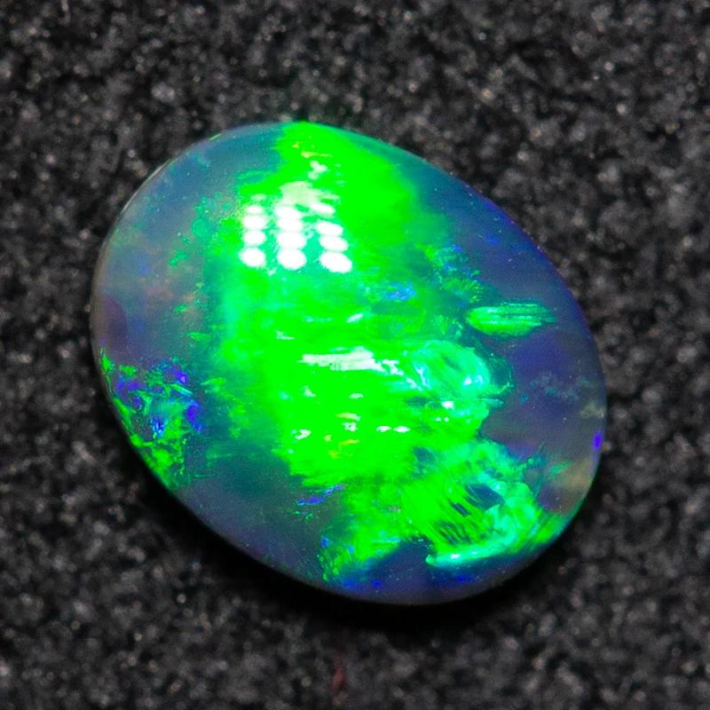 0.25 ct black crystal opal 5.1x4.1x1.8mm