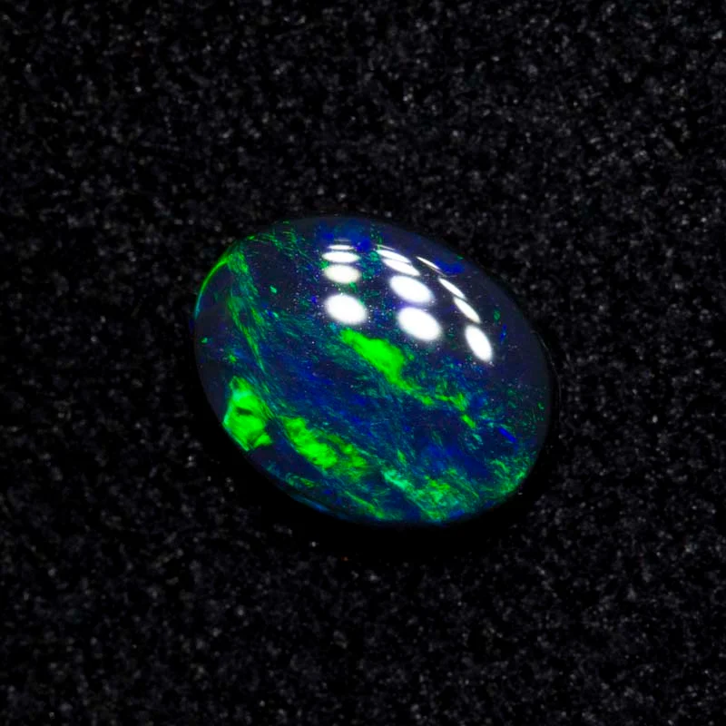 0.29 ct black opal 5.4x4.2x1.8mm