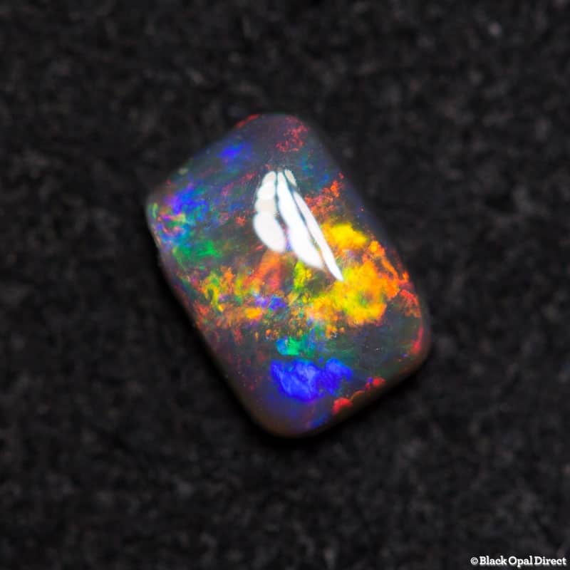 0.30 ct cushion shaped black opal 5x3.5x2mm