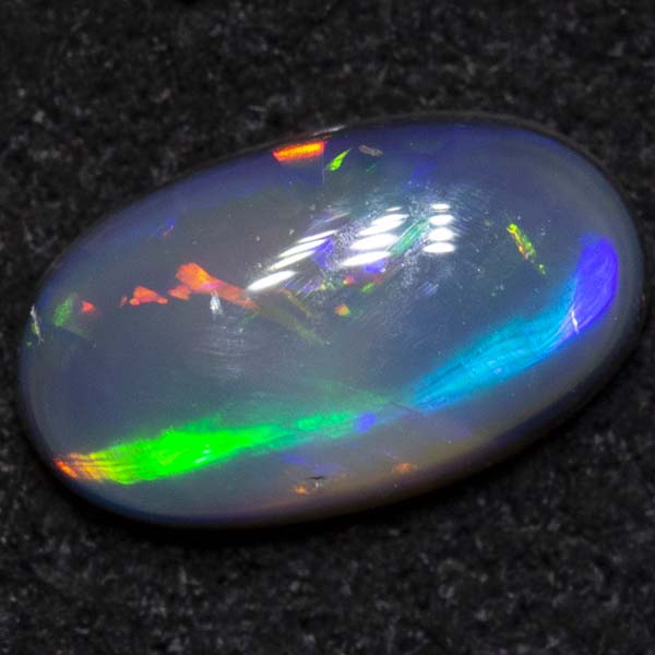 0.33 ct black opal 6.3x3.7x2.1mm