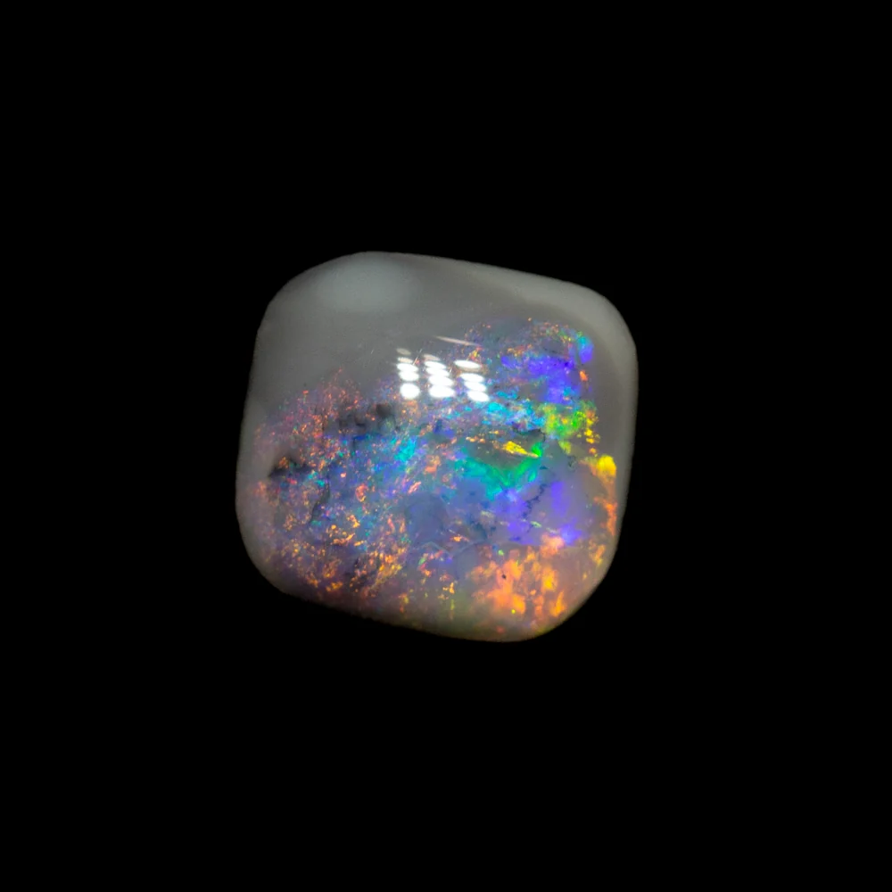 0.36 ct black opal 5.5x5.3x1.8mm