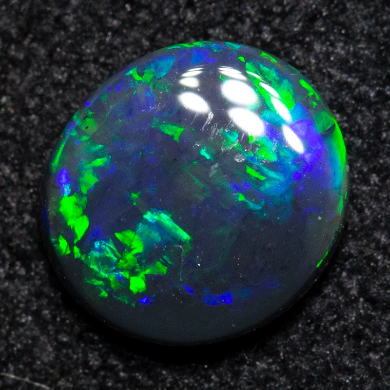 0.38 ct black opal 5.8x5.3x1.8mm