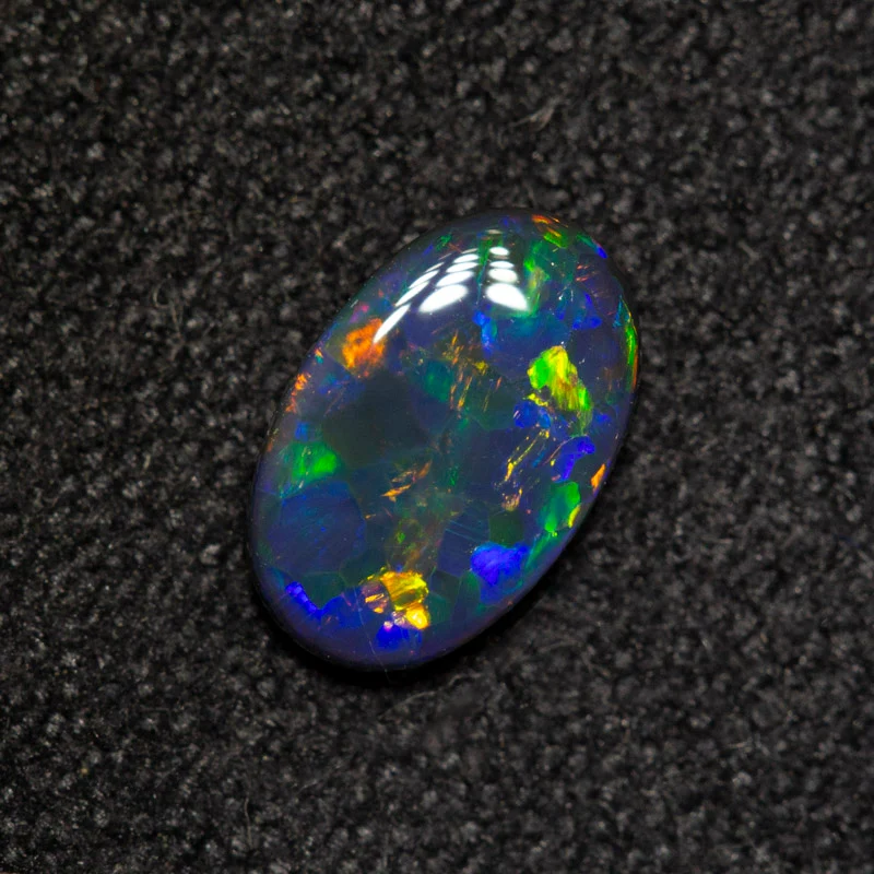 0.38 ct black opal 7x4.5x1.7mm - Image 2