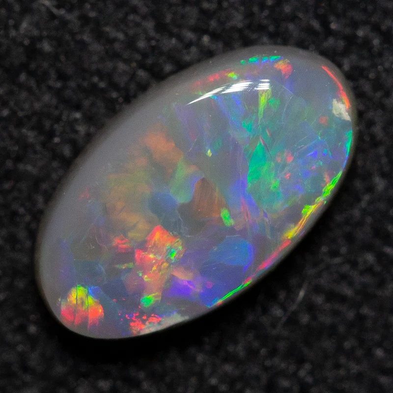 0.39 ct dark opal 7x4x2mm