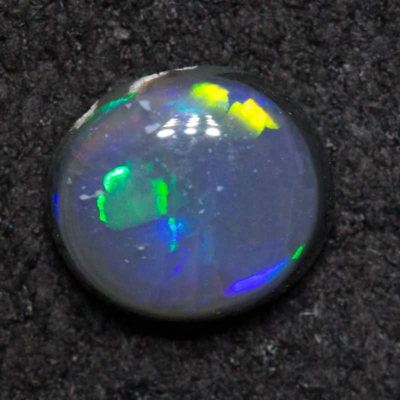 0.40 ct black opal 5.3x4.7x2.4mm
