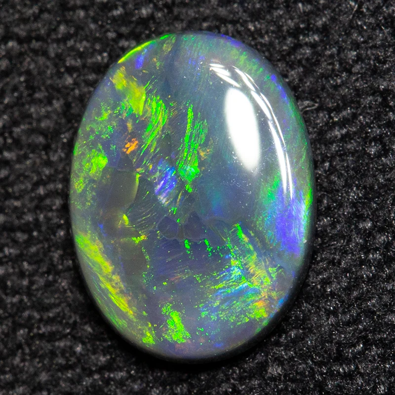 0.40 ct black opal 7.1x5.3x1.6mm