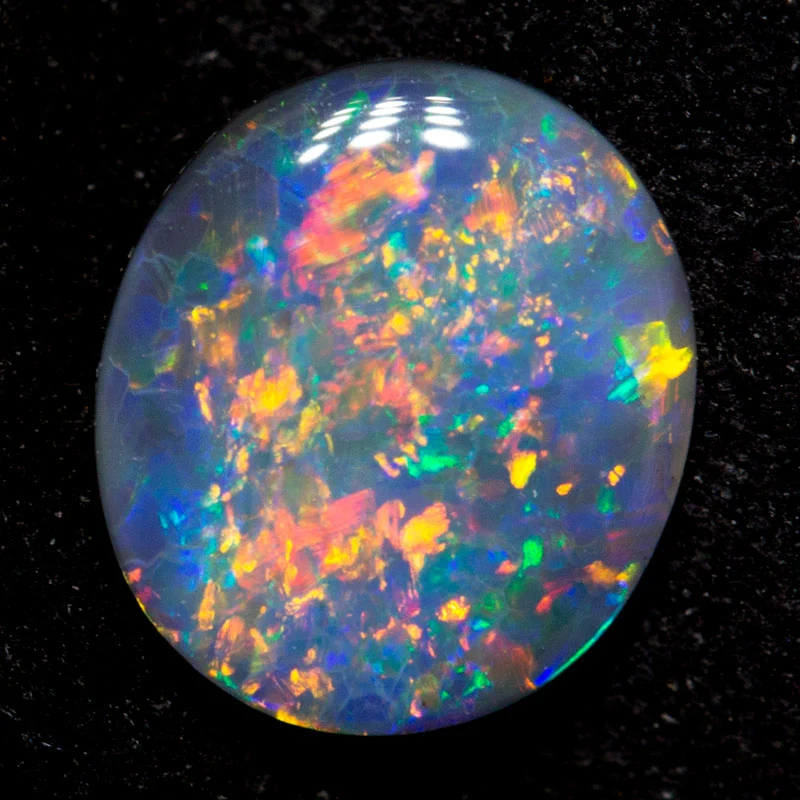 0.41 ct black opal 6.8x6.1x1.4mm