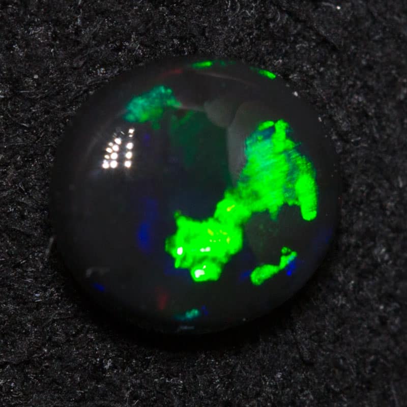 0.44 ct black opal 5.5x5x2mm