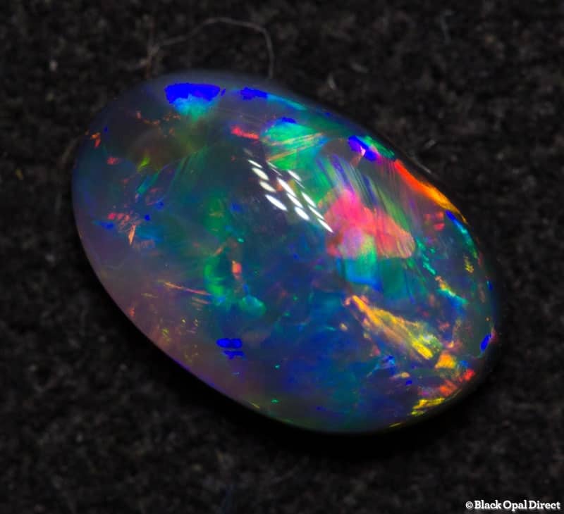 0.46 ct black opal gem 7x4.5x2mm