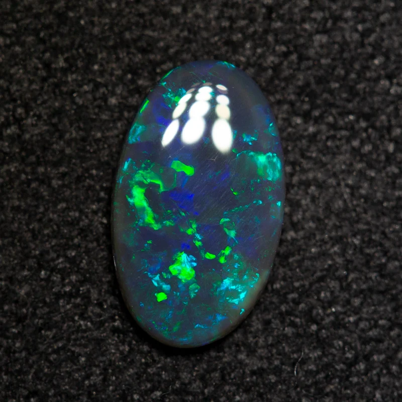0.48 ct black opal 8.3x5x1.6mm - Image 2