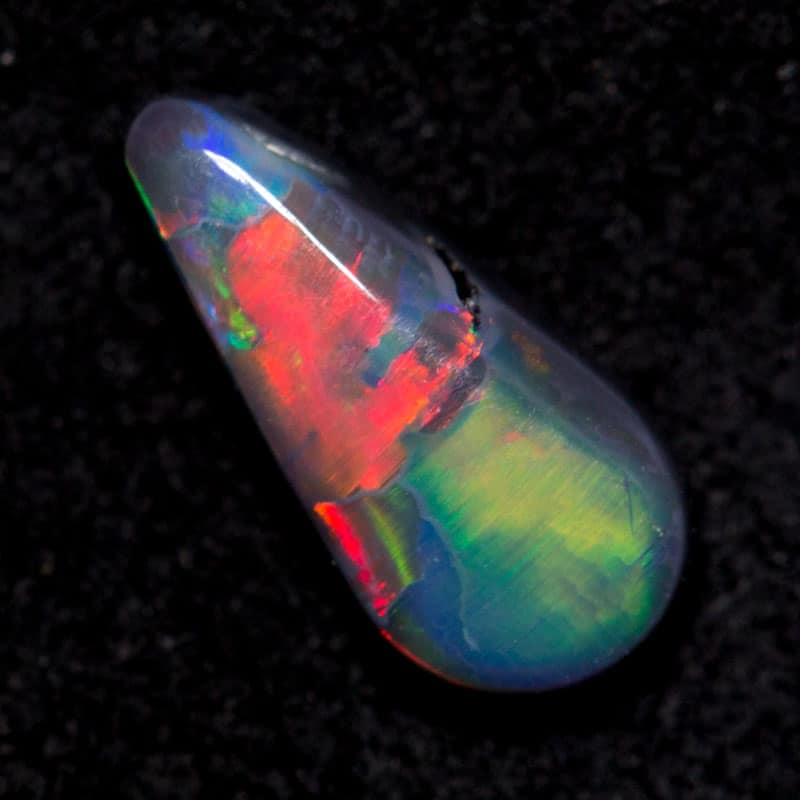 0.49 ct black opal 8.8x4.2x2.3mm