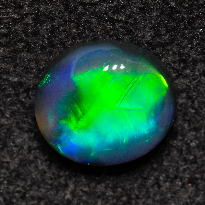 0.54 ct black opal 5.8x5.3x2.5mm