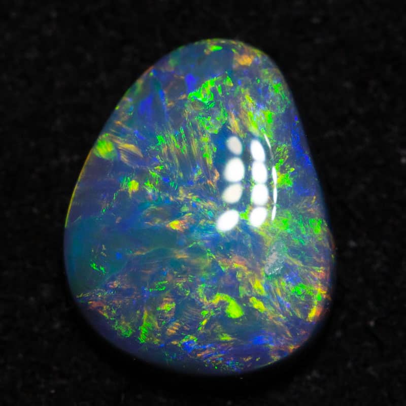 0.57 ct black opal 7.2x5.6x2.3mm