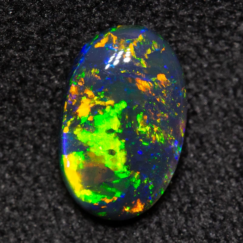 0.58 ct black opal 7.5x5.8x2.4mm