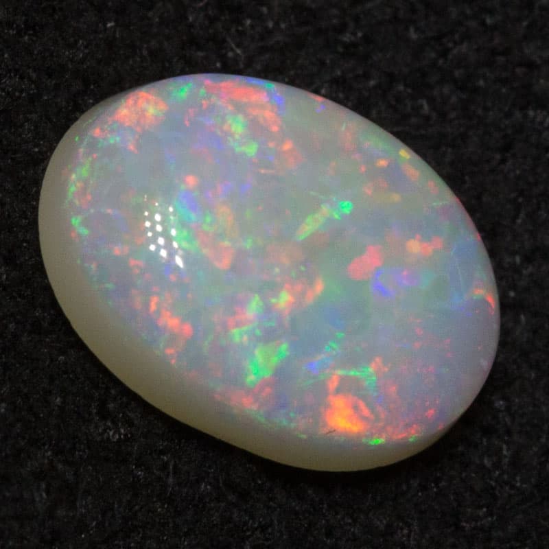 0.58 ct white opal 6.8x4.9x2.4mm