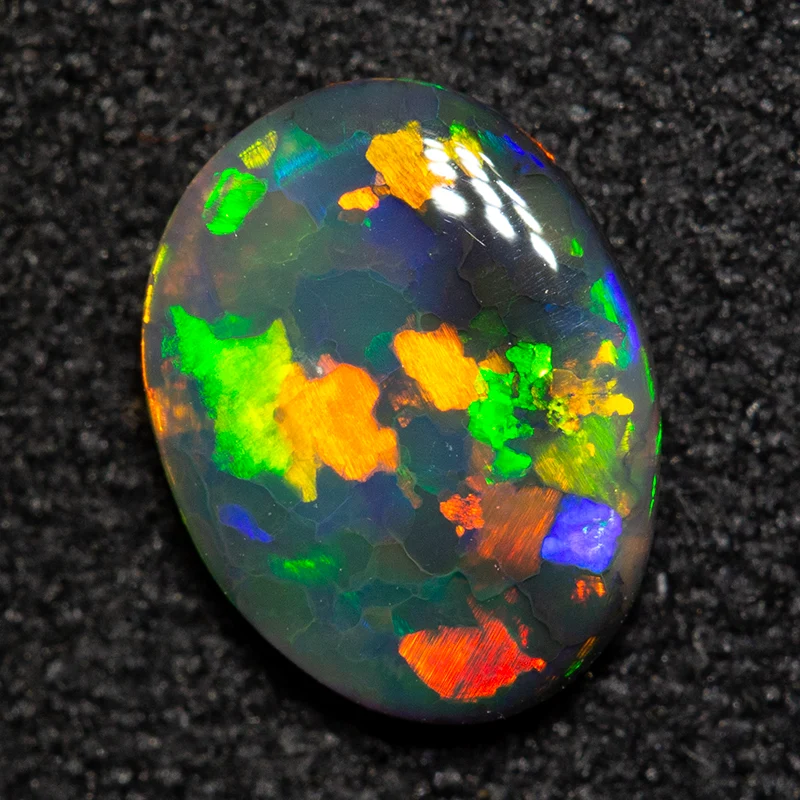 0.59 ct black opal 7.8x6x2.1mm