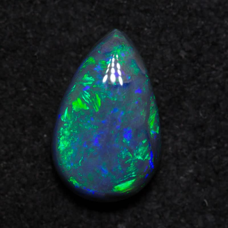 0.60 ct black opal 7.4x4.7x2.7mm