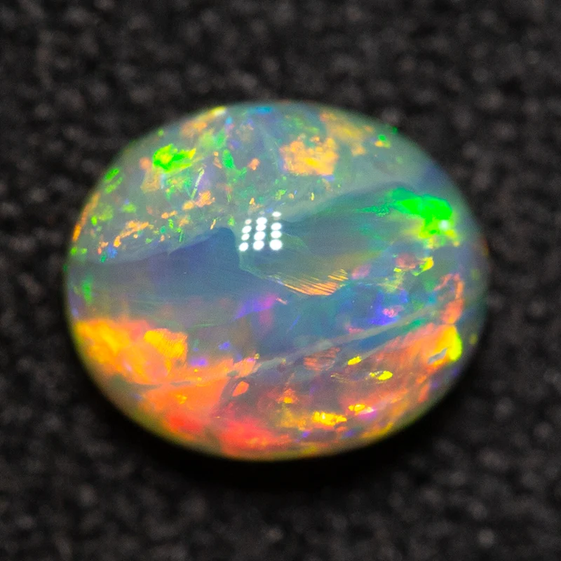 0.60 ct crystal opal 5.7x4.8x3.5mm