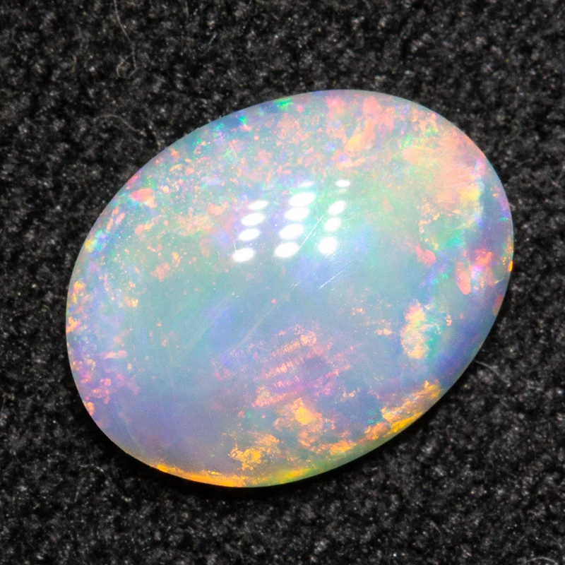 0.61 ct white opal 7.7x6x2.1mm - Image 2