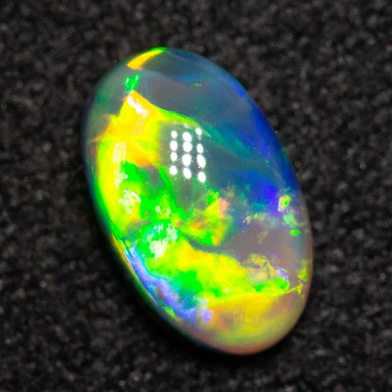 0.62 ct crystal opal 6.9x4.3x3.3mm - Image 2