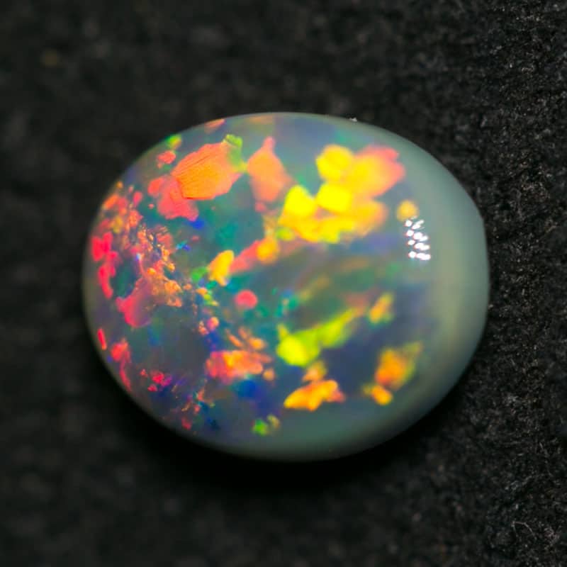 0.62 ct semi black opal 6.5x5x3mm