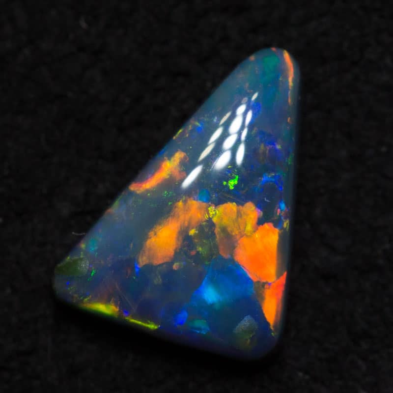 0.63 ct black opal 7.5x6.5x2mm