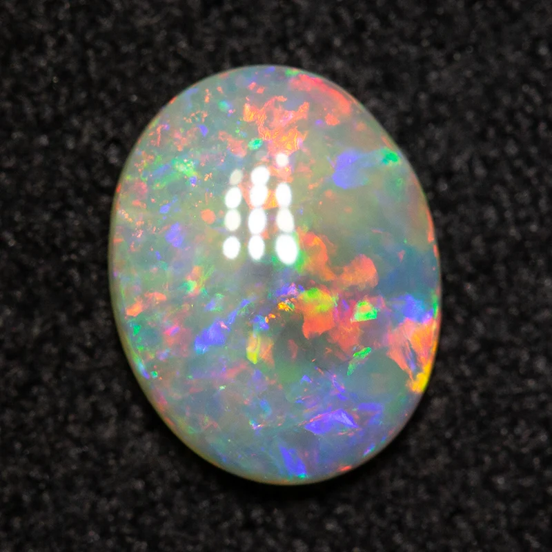 0.63 ct crystal opal 7.6x5.9x2.2mm - Image 3