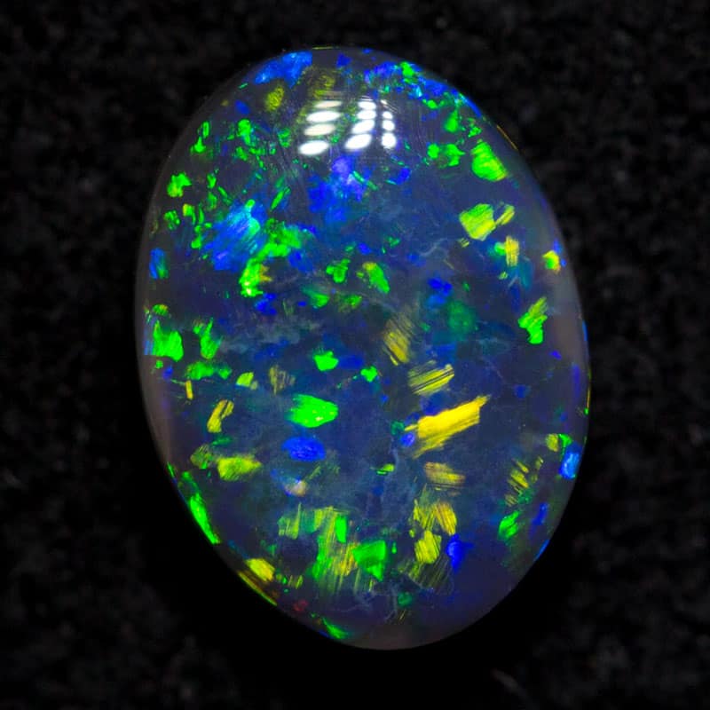 0.64 ct black opal 6.8x5.1x2.8mm