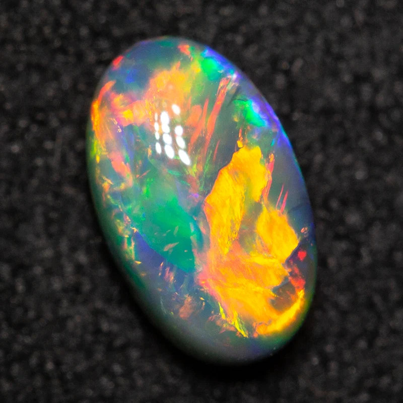 0.65 ct black opal 7.1x4.2x3.3mm