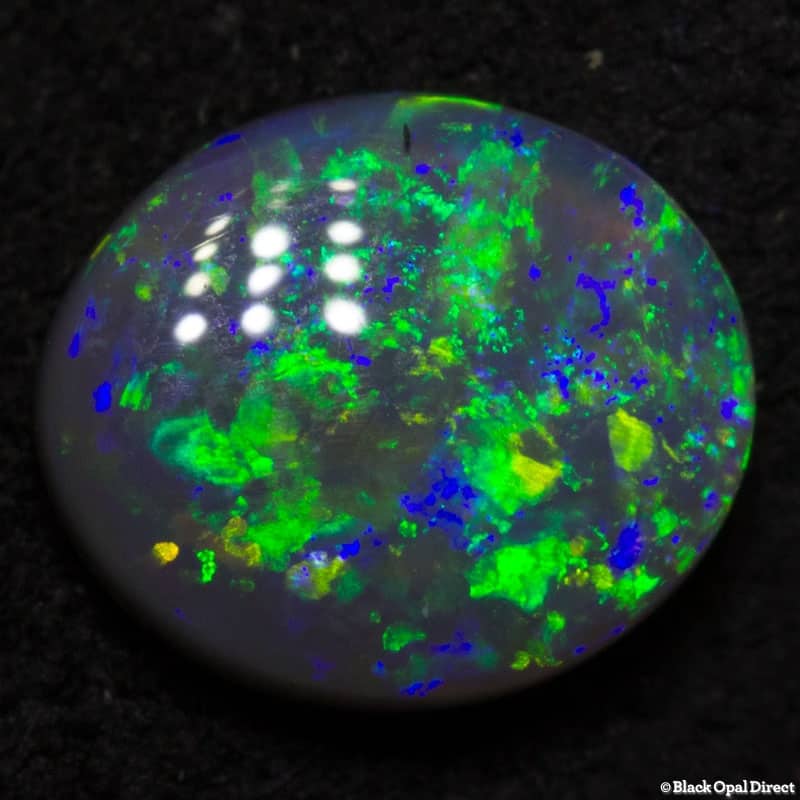 0.65 ct black opal 7x6x2mm