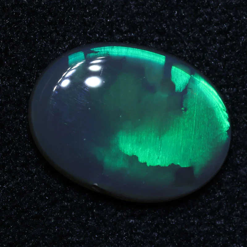 0.65 ct black opal 8x5.9x2.1mm