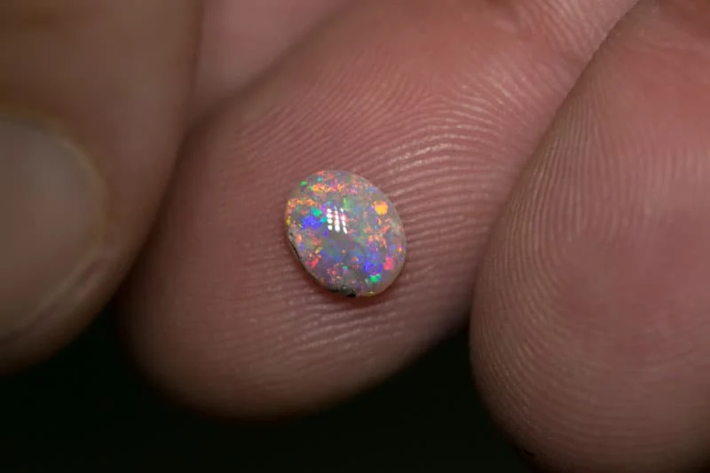 0.65 ct dark opal 7x5x2mm - Image 2