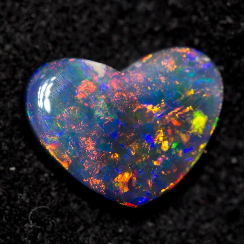 0.66 ct black opal 6.3x8x2.2mm