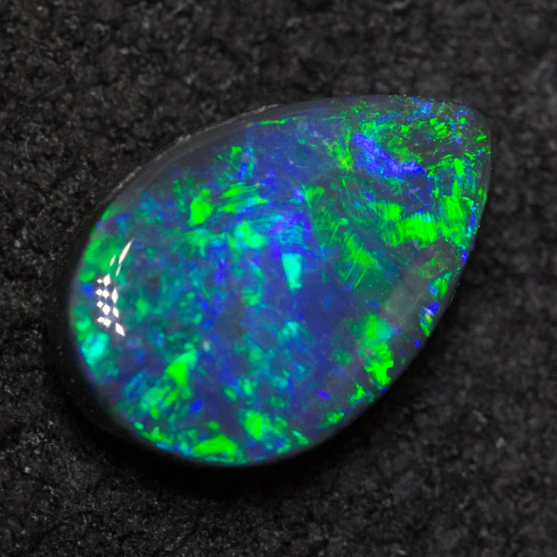 0.66 ct black opal 7.6x5.1x2.7mm