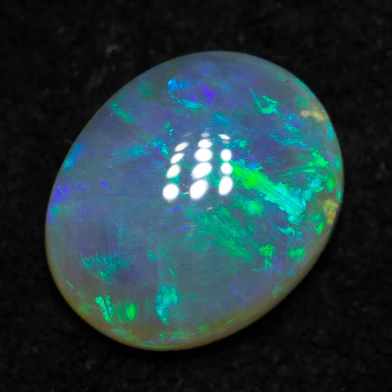 0.66 ct crystal opal 6.8x 5.5x2.8mm