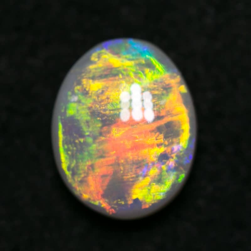 0.66 ct dark opal gem 6.5x5x2.5mm