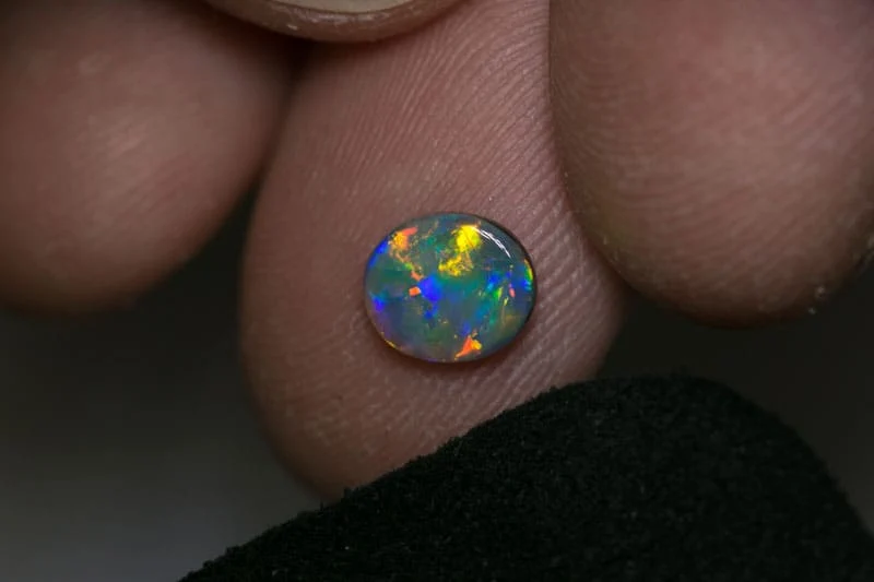 0.68 ct black opal 7x6x2mm - Image 3