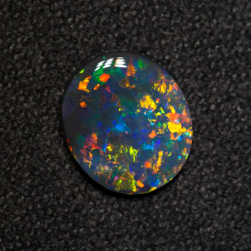 0.70 ct black opal 8x7x1.9mm - Image 2