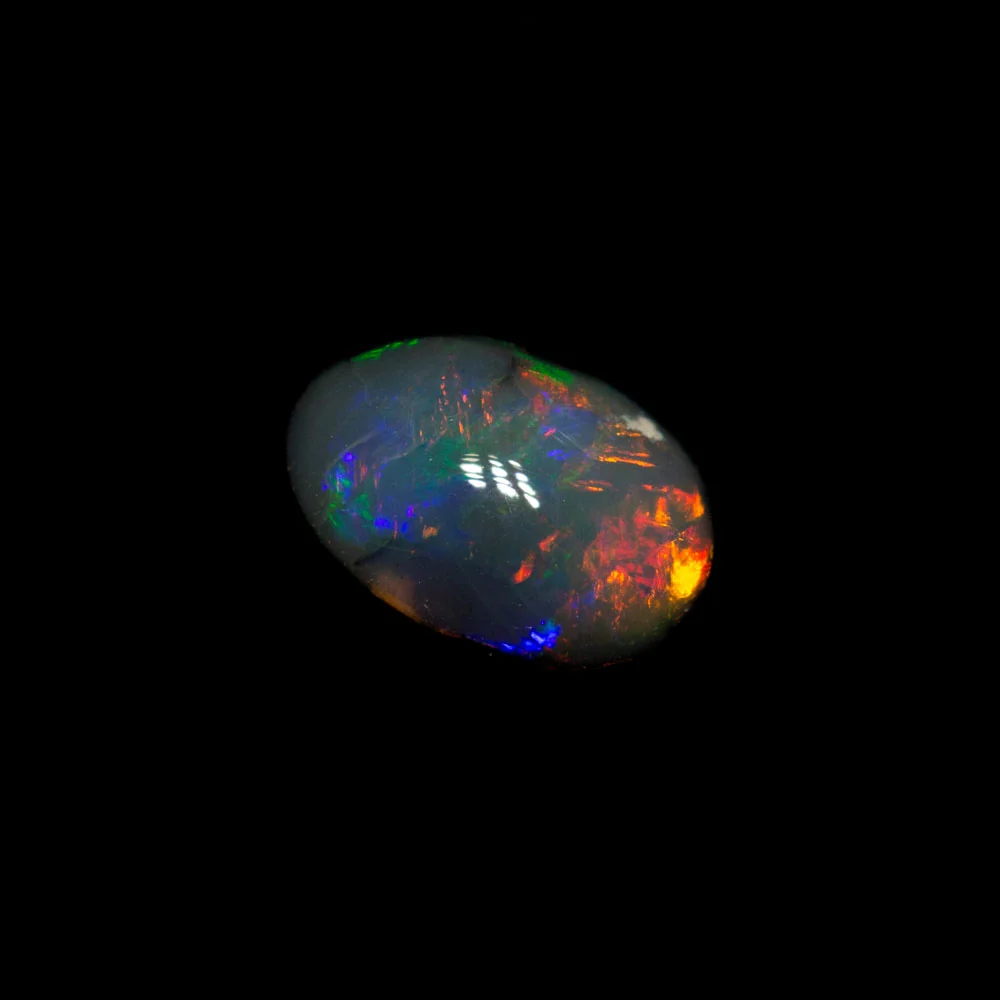 0.71 ct black opal 7x4.7x3.3mm - Image 2