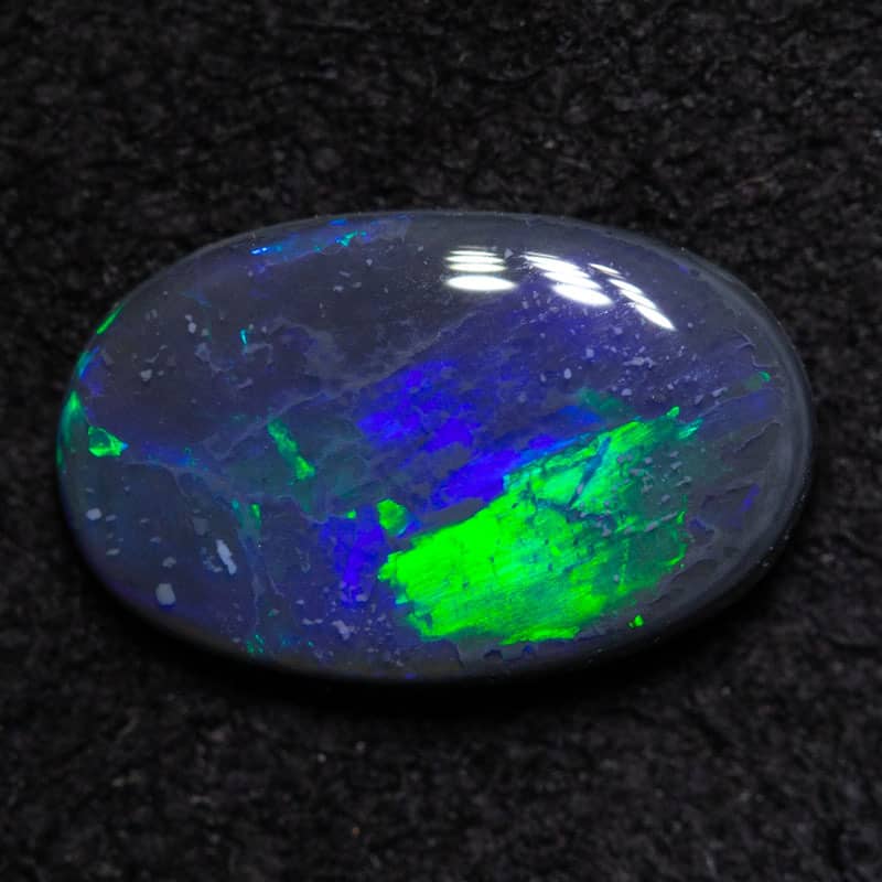 0.73 ct black opal 9x5.5x2mm