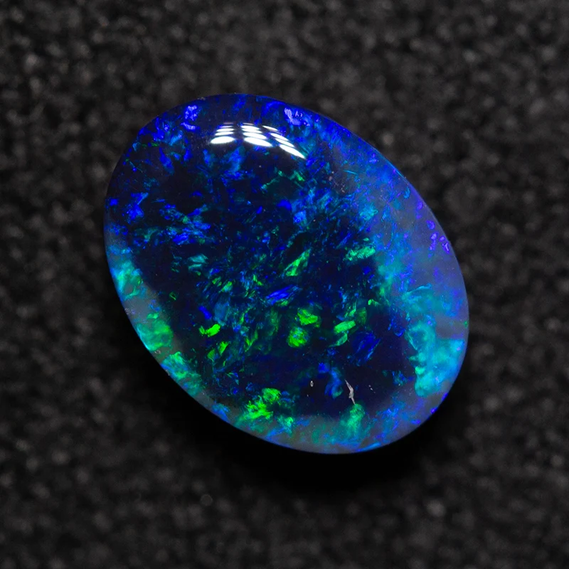 0.78 ct black opal 7.1x5.3x3.4mm - Image 4