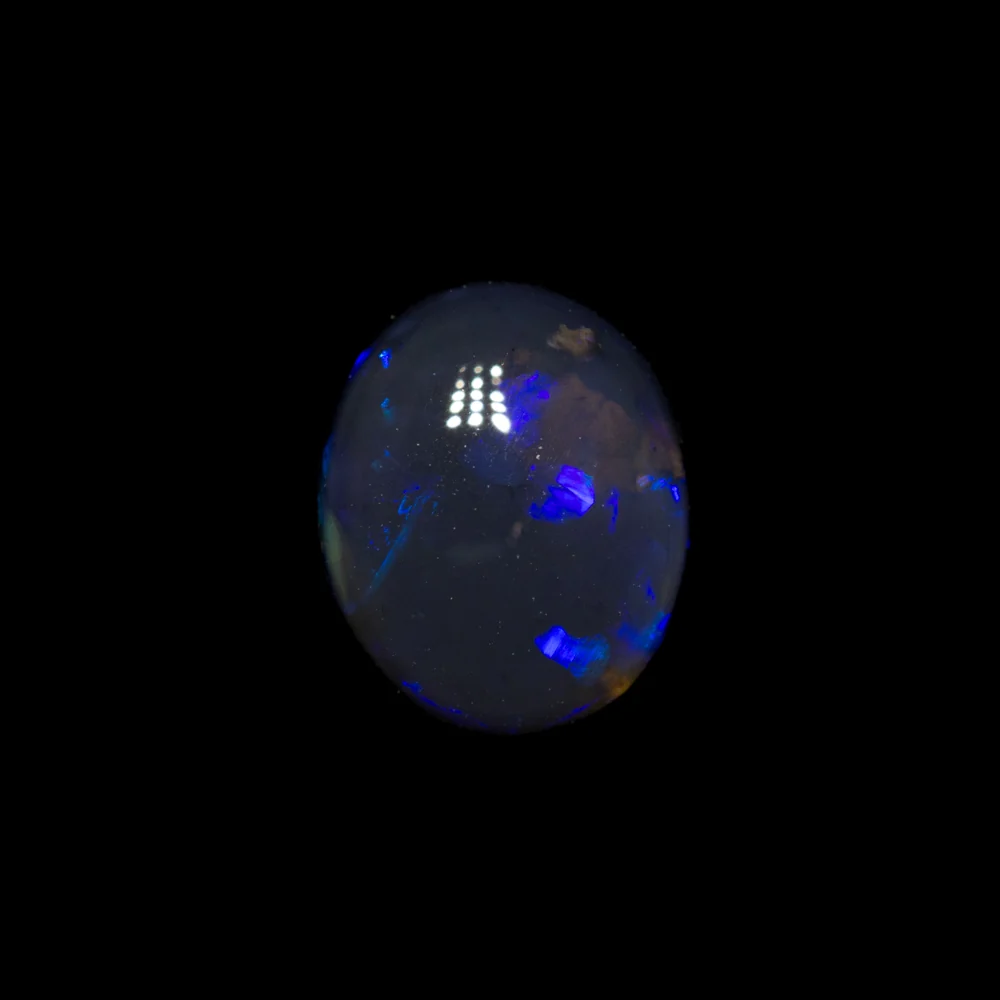 0.80 ct black opal 7x5.8x3.2mm - Image 2