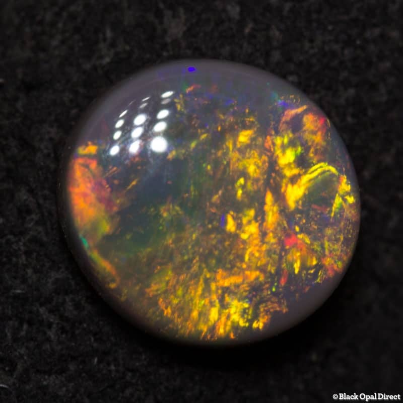 0.81 ct black opal 6.5x6x2.5mm