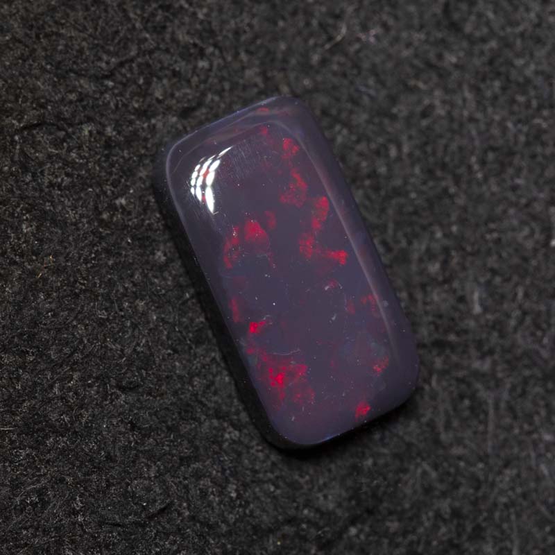 0.81 ct black opal 9x4x2.1mm