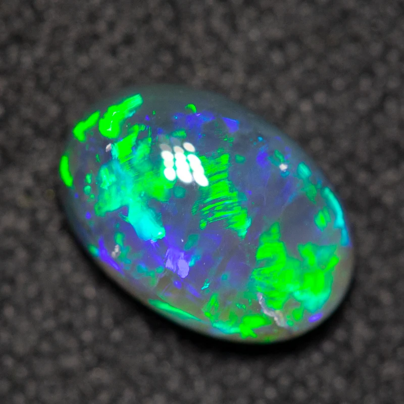 0.82 ct black crystal opal 7.8x5.4x3.3mm