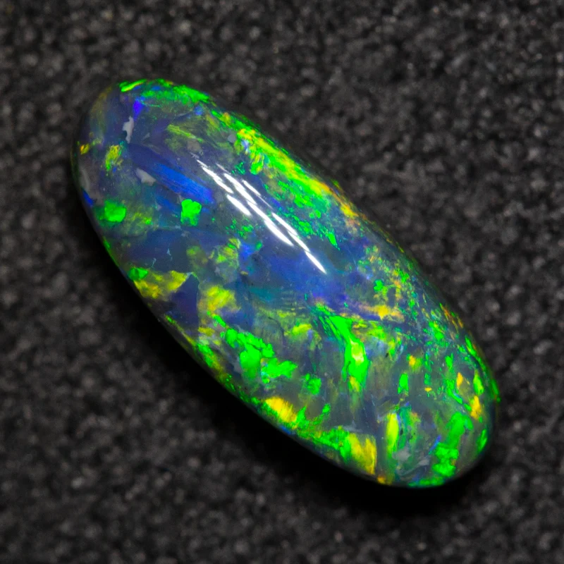 0.82 ct black opal 9.1x4x3.3mm - Image 2