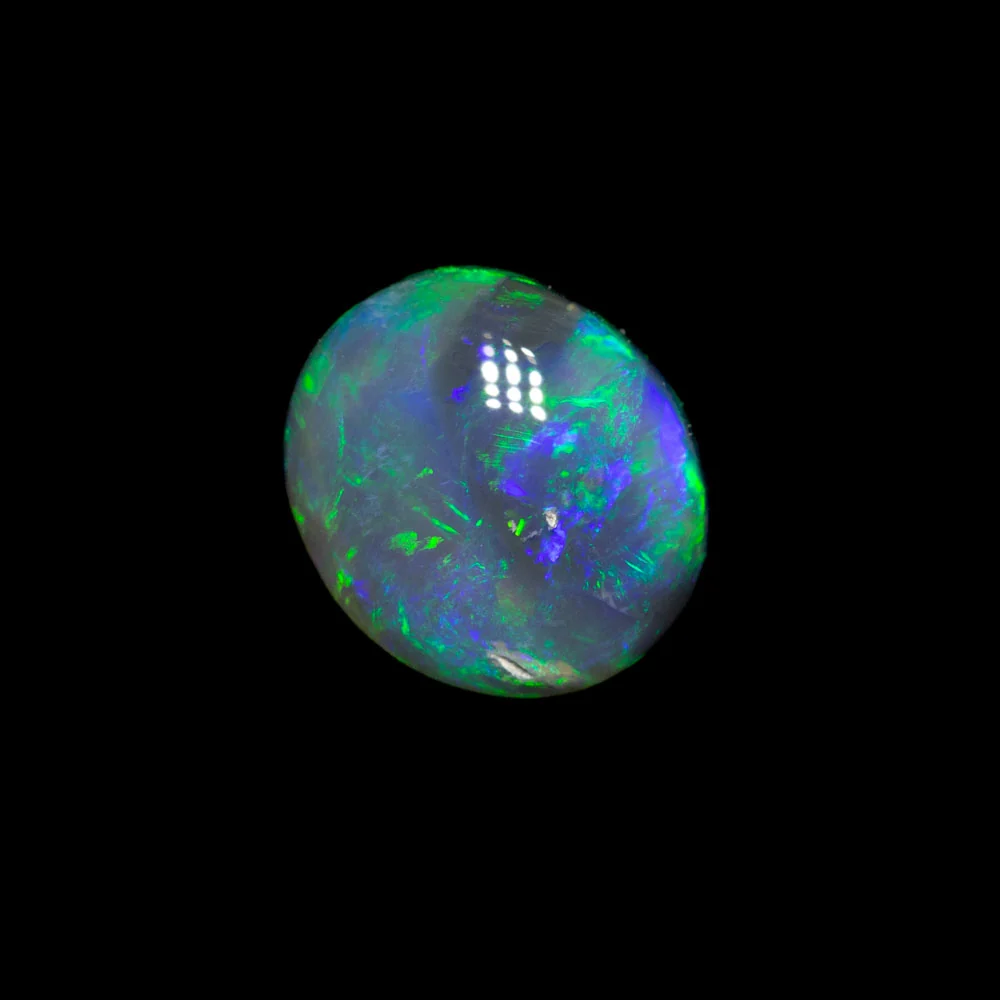 0.82 ct dark crystal opal 7x6.1x3mm