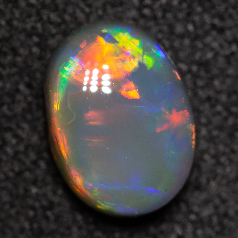 0.83 ct black opal 7.3x5.3x3.3mm - Image 2