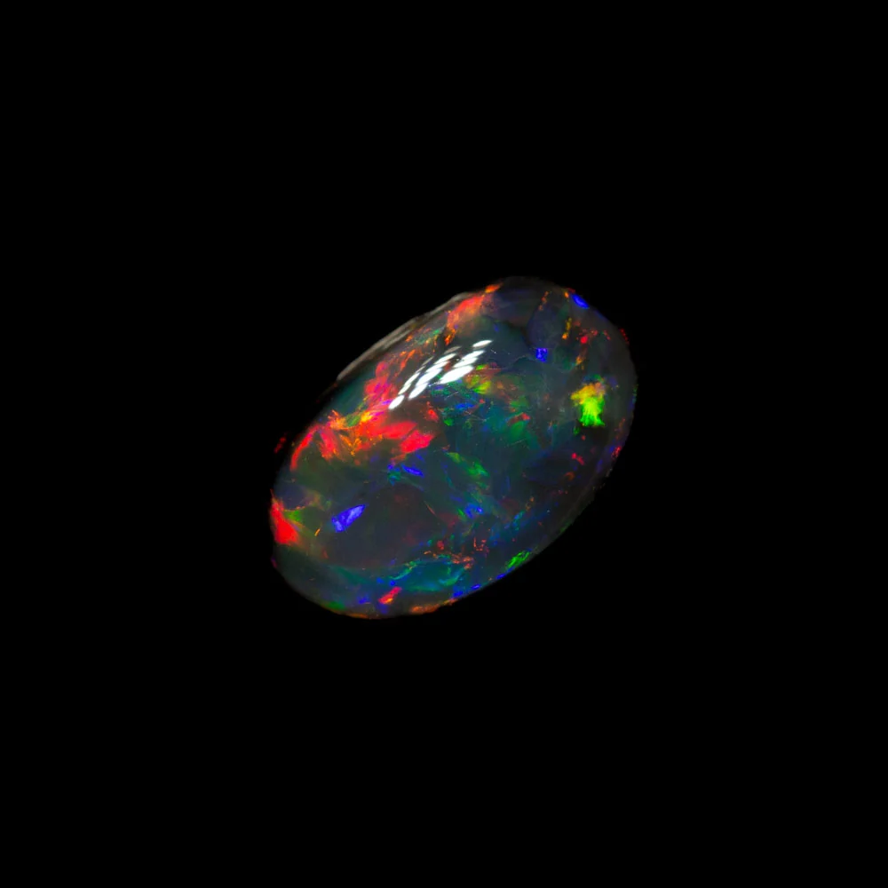 0.86 ct black opal 7.8x4.9x3.3mm