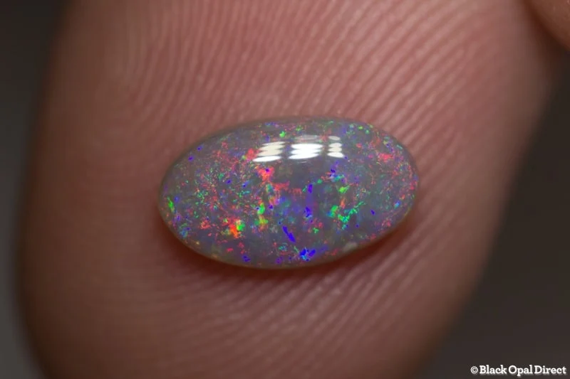 0.87 ct semi black opal 10x6x2mm
